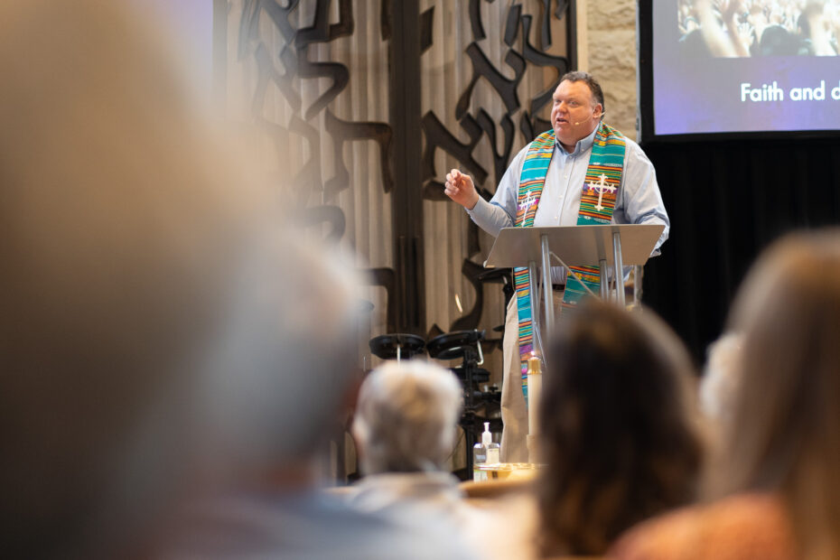 Pastor Mike Zdorow delivers a message to an engaged audience at The Gathering Place Church in Palm Beach Gardens.